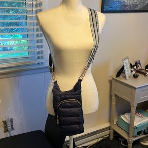 Puff crossbody water bottle purse.